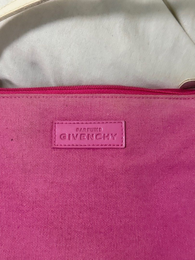 Authentic Givenchy Parfums Bag (Category: Purses & Pouches) located in Cebu City. Submitted by secondhandceb (Listing ID 1411966013, Image 3). Description: Authentic Givenchy Parfums bag slight discoloration / faded no major issues pretty in actual.