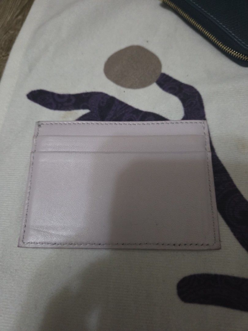 Authentic, Leather, Celine Paris Card Holder (Category: Luxury Bags & Wallets) located in Manila. Submitted by sterling_grace (Listing ID 1412022168, Image 2). Description: - Celine Paris, card holder - Light purple color - Multiple card slots - Celine logo on front - Made of leather - Simple, elegant design.