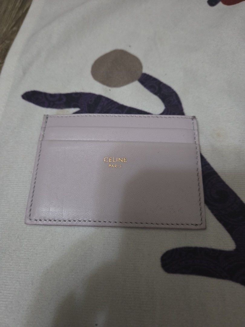 Authentic, Leather, Celine Paris Card Holder (Category: Luxury Bags & Wallets) located in Manila. Submitted by sterling_grace (Listing ID 1412022168, Image 1). Description: - Celine Paris, card holder - Light purple color - Multiple card slots - Celine logo on front - Made of leather - Simple, elegant design.