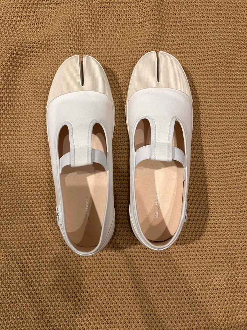 AUTHENTIC Maison Margiela Tabi Sneakers (Category: Sneakers & Footwear) located in Quezon City. Submitted by statstudioph (Listing ID 1412056707, Image 2). Description: AUTHENTIC Maison Margiela Tabi Sneakers PRODUCT NAME: Tabi On The Deck Canvas Sneakers SIZE: 43 SELLING PRICE: 25,000 CONDITION: Brand New - Only worn for less than an hour - Bought in Paris - Comes with the original dust bag and box RFS: Change of mind ORIGINAL PRICE EUR636 or ar