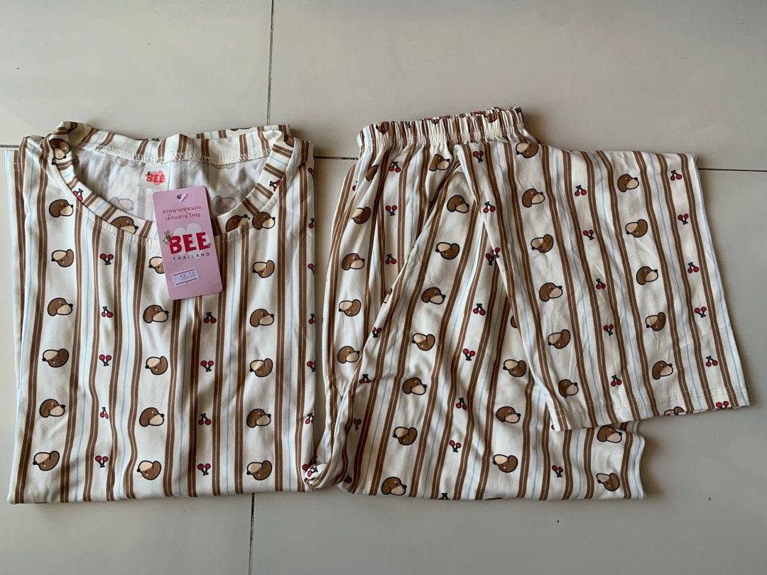 Bee Thailand Brand Pajama Set (Category: Undergarments & Loungewear) located in Quezon City. Submitted by theclosetqueen (Listing ID 1412010218, Image 1). Description: Fits small to large Measurements: Top - 46”x 25” Bottom - 23” to 38” waist, Length - 38”.