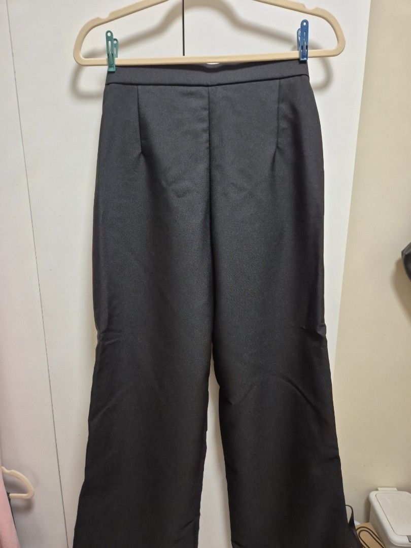 Black Office Pants Custom Adjustable Trousers (Category: Other Bottoms) located in Antipolo. Submitted by declutteringkingking (Listing ID 1412024388, Image 3). Description: - Adjustable, fits XS-S - Classic black dress pants - Tailored fit - Straight leg cut - Hook and bar closure - Ideal for formal or business attire - Smooth, woven fabric.