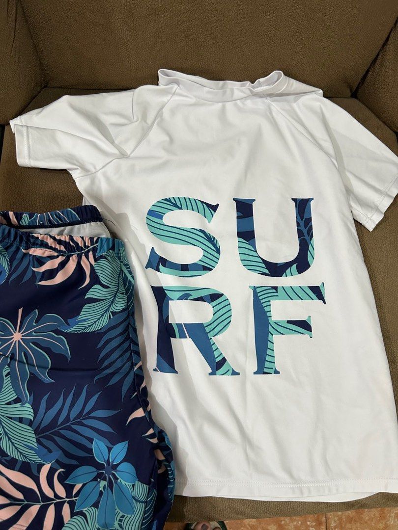 Board shorts/ swimming attire (Category: Babies & Kids Fashion) located in Quezon City. Submitted by thei. (Listing ID 1373271816, Image 2). Description: For boys Like new Blue shark 150 Surf white pair 200 Black top 100 Cotton on brown 100.