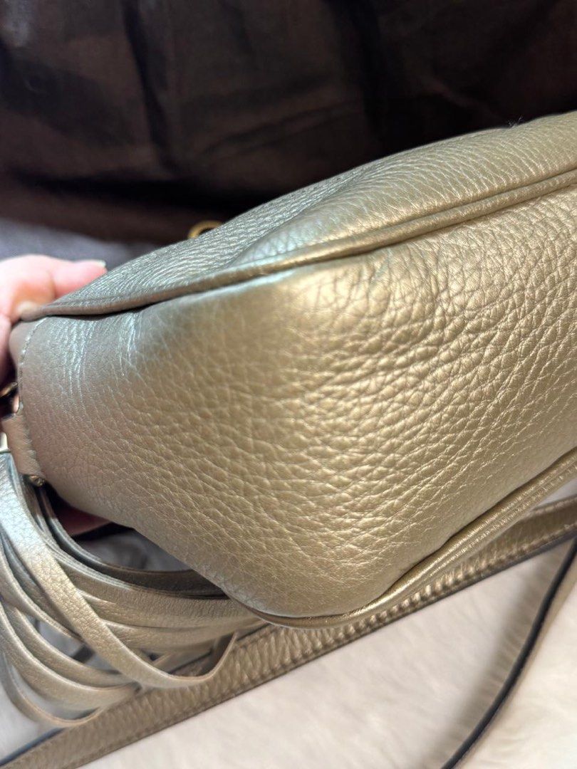 Brand New & Authentic Gucci Soho Disco Bag (Category: Luxury Bags & Wallets) located in Makati City. Submitted by excessthings.ph (Listing ID 1411998216, Image 3). Description: Gucci Brand New Stored for a long time never been used 100% Authentic - Comes with Dustbag only - Guaranteed Authentic - Leather - Metallic finish - Iconic interlocking GG logo - Features a shoulder strap and tassel detail - Includes dust bag - Shape well-maintained.