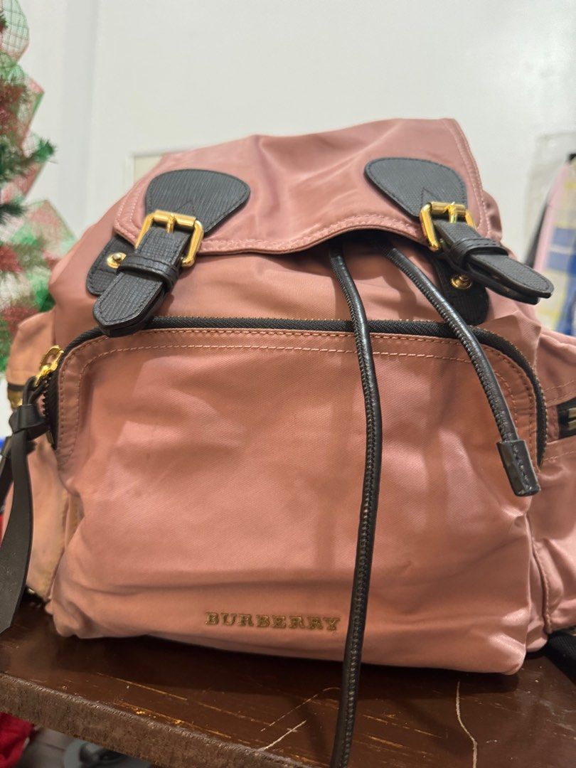 BURBERRY Pink/Black Technical Nylon And Leather Medium Rucksack Backpack Bag (Category: Luxury Bags & Wallets) located in Echague. Submitted by jenniferbo94771 (Listing ID 1412037376, Image 2). Description: BURBERRY Pink/Black Technical Nylon And Leather Medium Rucksack Backpack Bag Good condition 3200.