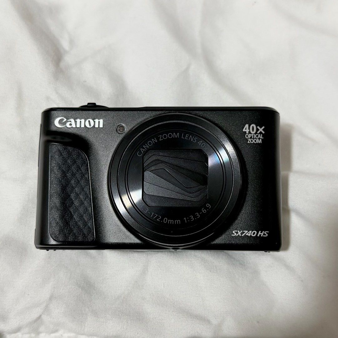 Canon PowerShot SX740 HS Digital Camera (w/ live photo function) (Category: Cameras) located in San Fernando. Submitted by foreveraash (Listing ID 1411425622, Image 1). Description: LAST PRICE POSTED Brand New (bought november 2025) With warranty (need to fill up at canons app) Complete (Original box, Battery, Charger and Original Strap) 20.3MP CMOS Sensor DIGIC 8 Image Processor 24-960mm (35mm Equivalent) 40x Optical Zoom with OIS 3" Tilting LCD