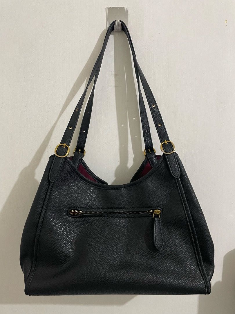 Coach Lori Bag (Category: Luxury Bags & Wallets) located in Magalang. Submitted by byali (Listing ID 1412102938, Image 2). Description: Pebbled leather Authenticity not guaranteed (bought from Carousell) No issues apart from the missing magnet on the front compartment (as seen from photos) Made in Vietnam.