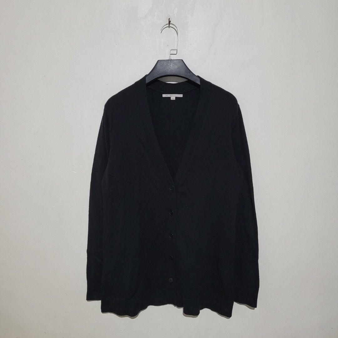 Gap Black Cardigan (Category: Coats, Jackets and Outerwear) located in Quezon City. Submitted by eivan____orong (Listing ID 1411986219, Image 1). Description: Medium to Large fittings 📐 28L x 19-20w Good Condition 1 missing button - Gap black cardigan - V-neck - Button closure - Made in Japan - Material: 55% nylon, 30% wool, 15% acrylic - Minor hole on sleeve.