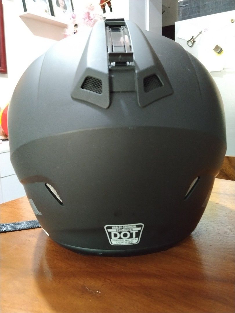 Harley-Davidson Motorcycle Helmet (size small) (Category: Helmets and other Riding Gears) located in San Juan City. Submitted by solnbart (Listing ID 1412001035, Image 3). Description: - Harley-Davidson motorcycle helmet - Matte black finish - Clear visor - Size: S - Harley-Davidson logo on front and back - Comfortable interior lining - Chin strap for secure fit - DOT safety certified.