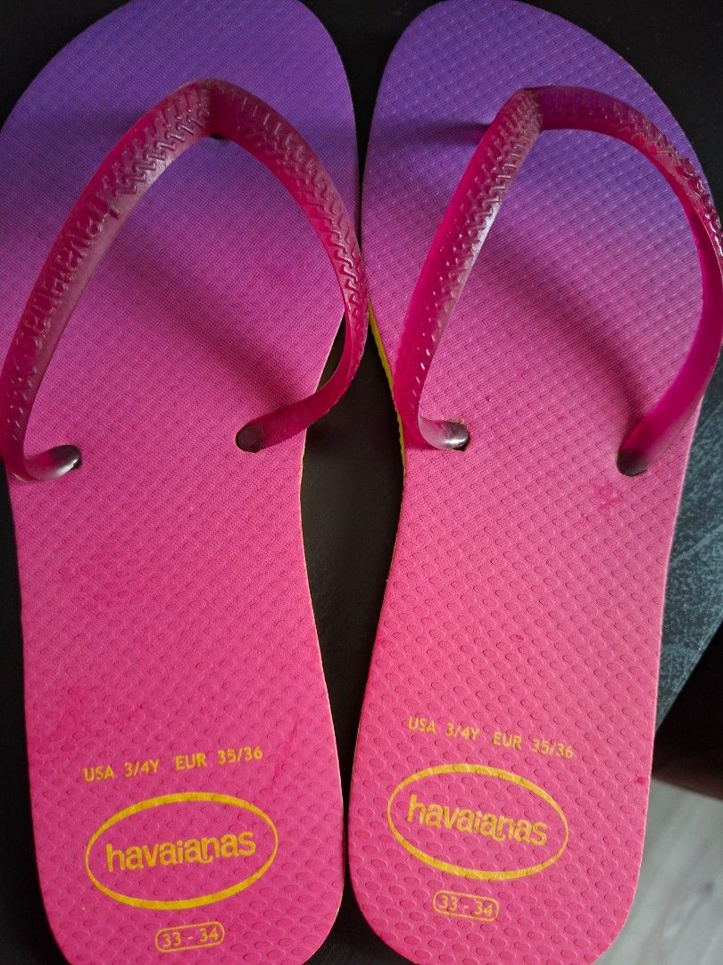 Havaianas Flip-Flops - Pink/Purple - Size 33/34 (Category: Flipflops and Slides) located in Singapore. Submitted by tehosd (Listing ID 1411969913, Image 1). Description: - Havaianas flip-flops - Size: 33/34 - Colour: Pink and purple gradient - Condition: brand new with clean soles (slightly dusty cos in bag for a while. will clean before deal) - Perfect for casual wear and the beach.
