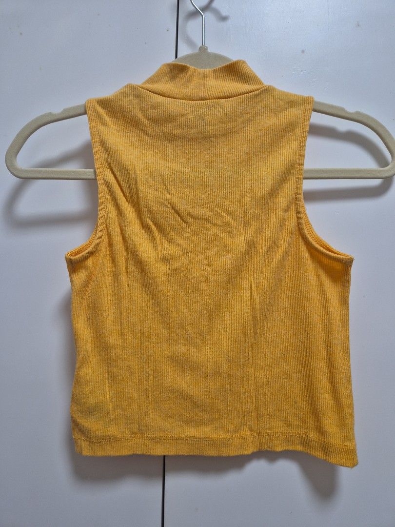 H&M yellow turtleneck sleeveless top (Category: Sleeveless) located in Antipolo. Submitted by declutteringkingking (Listing ID 1411986339, Image 3). Description: fits XS-S.