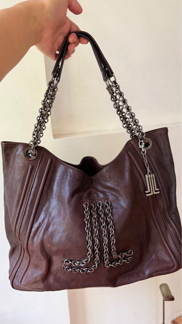 Lanvin Tote Bag (Category: Luxury Bags & Wallets) located in Malolos. Submitted by flapnbloom.ph (Listing ID 1411975855, Image 2). Description: - Original Lanvin leather tote, Brown - Size 14x12 inches - With leather conditoner mark but still matches the color, minimal sign of used but still in very good condition - Comes with Lanvin bling .