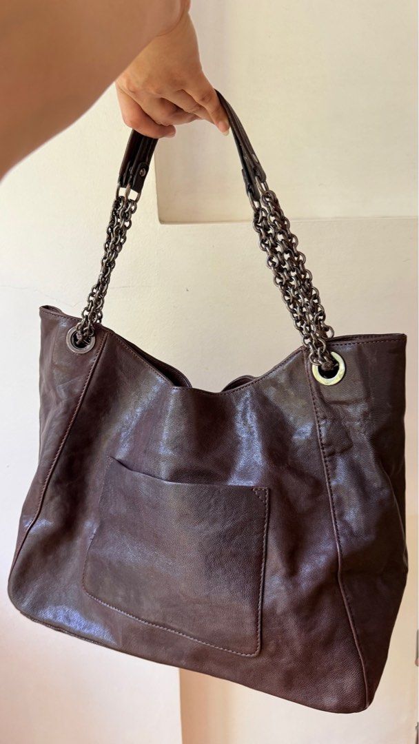 Lanvin Tote Bag (Category: Luxury Bags & Wallets) located in Malolos. Submitted by flapnbloom.ph (Listing ID 1411975855, Image 3). Description: - Original Lanvin leather tote, Brown - Size 14x12 inches - With leather conditoner mark but still matches the color, minimal sign of used but still in very good condition - Comes with Lanvin bling .