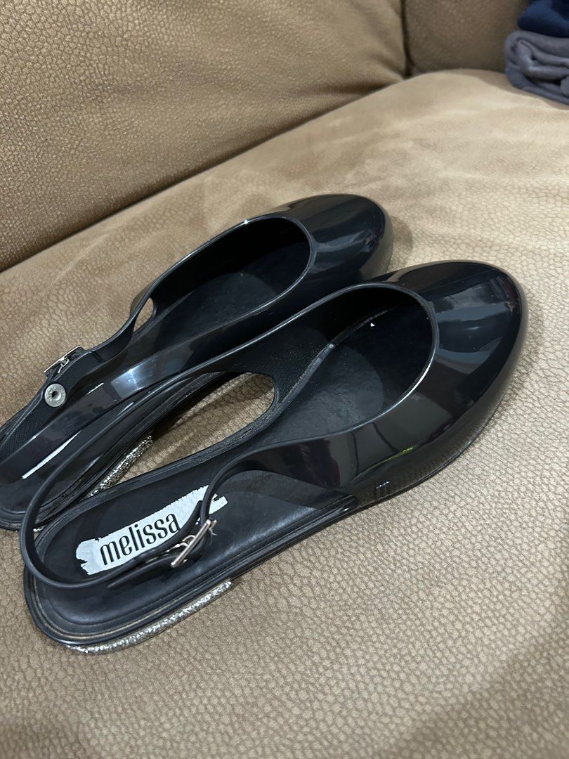 Melissa Lipstick AD Black Glitter Sandals (Category: Flats & Sandals) located in Quezon City. Submitted by thei. (Listing ID 1411985015, Image 2). Description: Slightly used 9/10 Melissa og with box - Black Melissa Lipstick AD sandals - Size: USA 5 - Slingback style with buckle - Color: Black/Glitter.