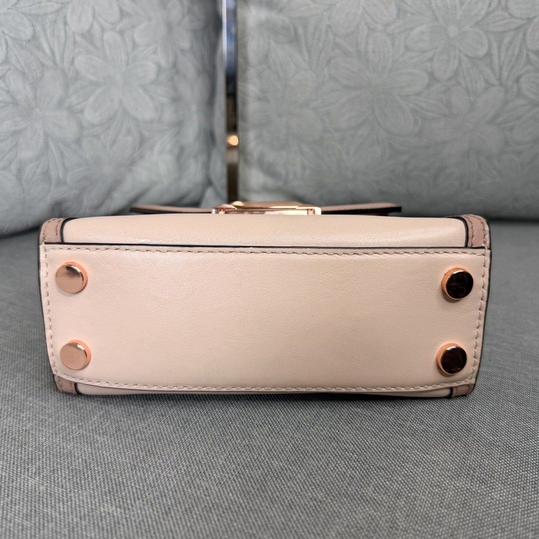 Michael Kors Whitney Mini Satchel (Category: Luxury Bags & Wallets) located in Quezon City. Submitted by bagsbycee (Listing ID 1412010312, Image 3). Description: Michael Kors Whitney Mini Satchel 💯Guaranteed Authentic - Condition: Rank A - Material: Rose Pink Leather & Gold Hardware - Inclusions: With Sling - Flaw: Sign of use in hardware very minimal ₱5200 💬 DM us to mine or reserve. Our items are authentic, pre-loved pieces and may show light