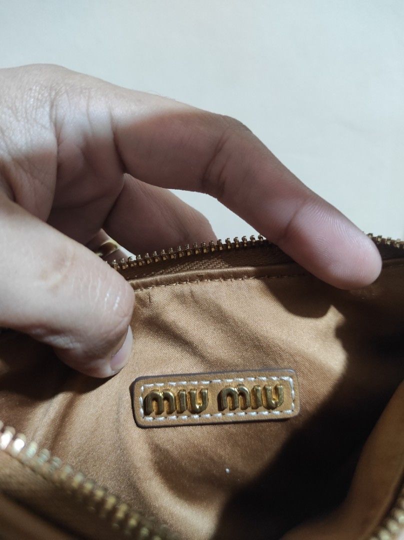 Miumiu mini bag (Category: Luxury Bags & Wallets) located in Manila. Submitted by luxxxxxxxx.x (Listing ID 1412064601, Image 2). Description: excellent condition.