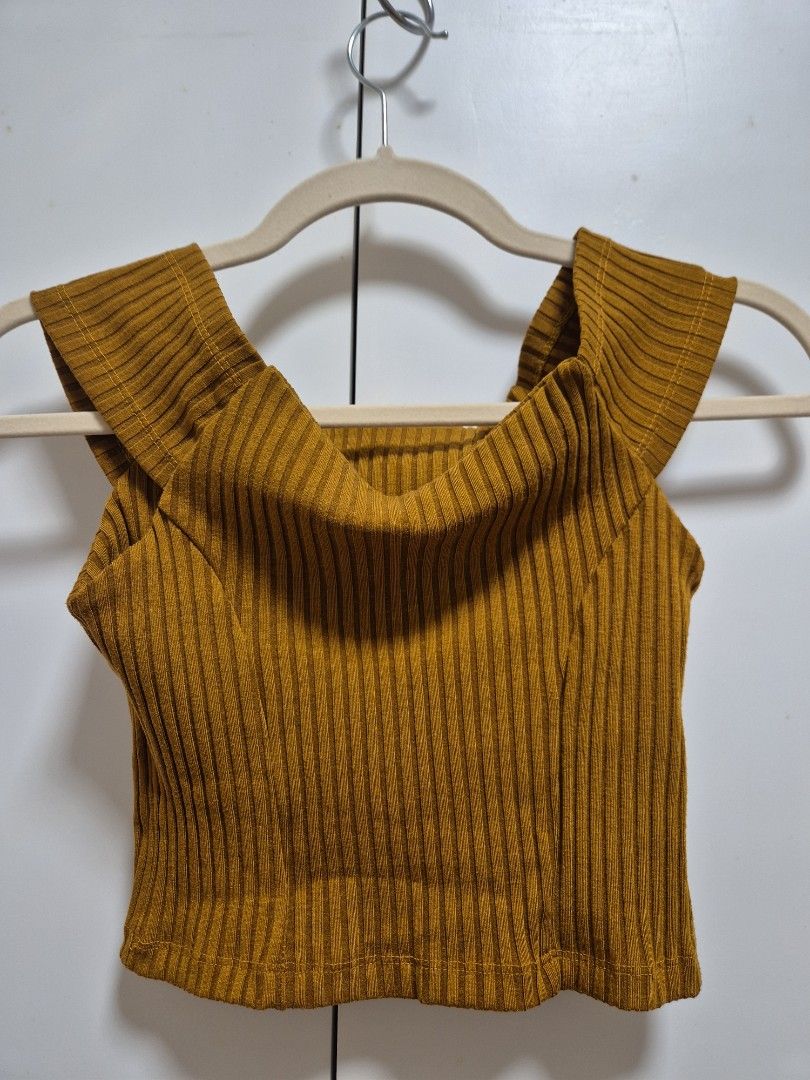 Mustard Yellow Ribbed off shoulder top (Category: Blouses) located in Antipolo. Submitted by declutteringkingking (Listing ID 1412013937, Image 1). Description: - Mustard yellow color - Ribbed design - off shoulder - Knit fabric - Solid color - Versatile style.