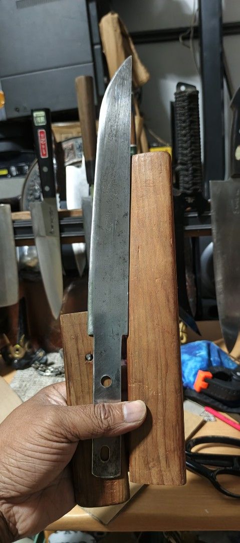 Nicholson No. 25 Knife with Sheath (Category: Knives & Chopping Boards) located in Polomolok. Submitted by dkljapansurplus (Listing ID 1412090596, Image 1). Description: - Vintage Nicholson No. 25 knife - Blade length 236mm - Includes wooden sheath - Blade marked "Nicholson USA No. 25" - Features a wooden handle.