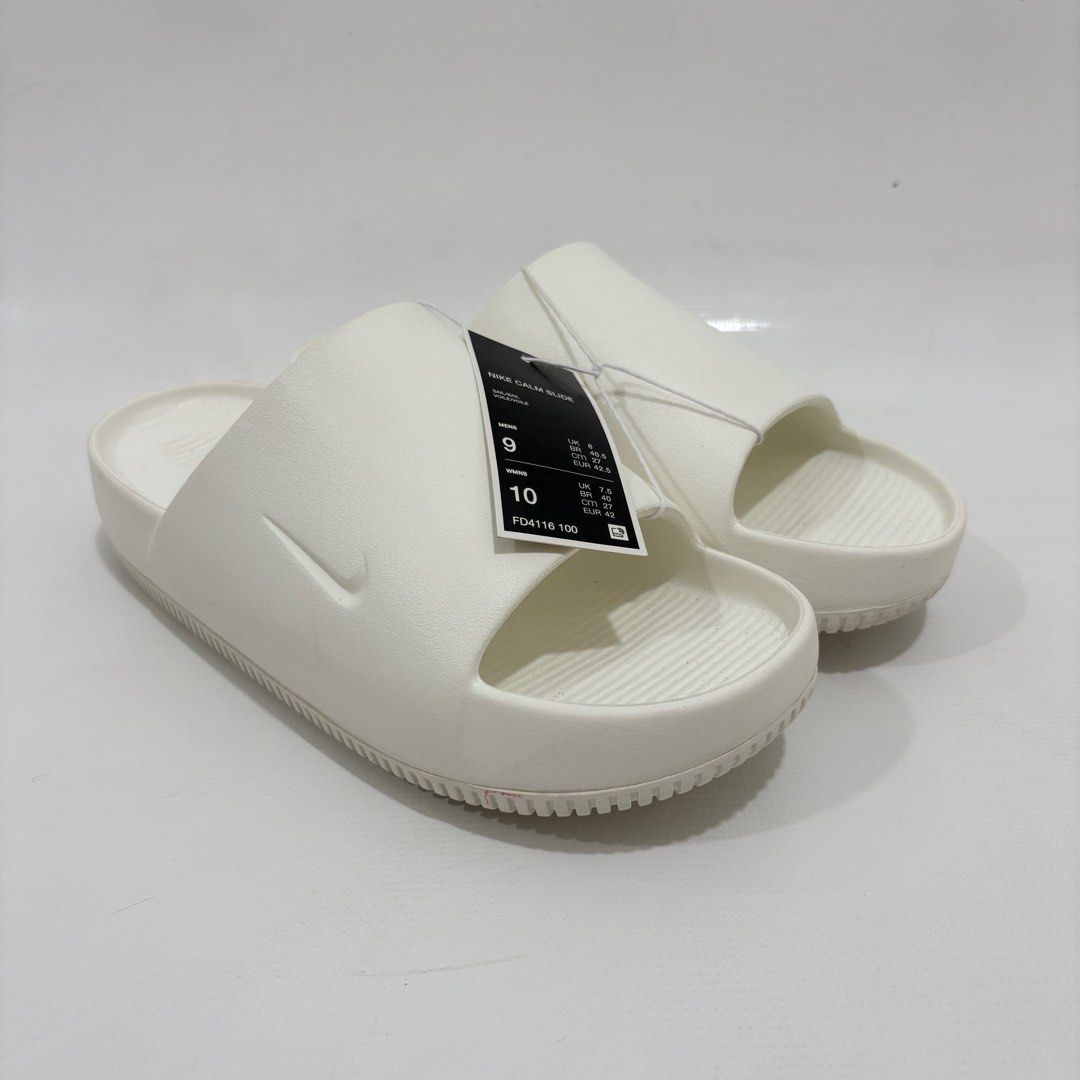 Nike Calm Men's Slide - Sail/Sail (Category: Slippers & Slides) located in Quezon City. Submitted by cobbie03 (Listing ID 1411991836, Image 2). Description: - Nike Calm Slides - Color: SAIL - Available Sizes: 9 and 10 - New with tags - Textured sole for grip - Perfect for casual wear.