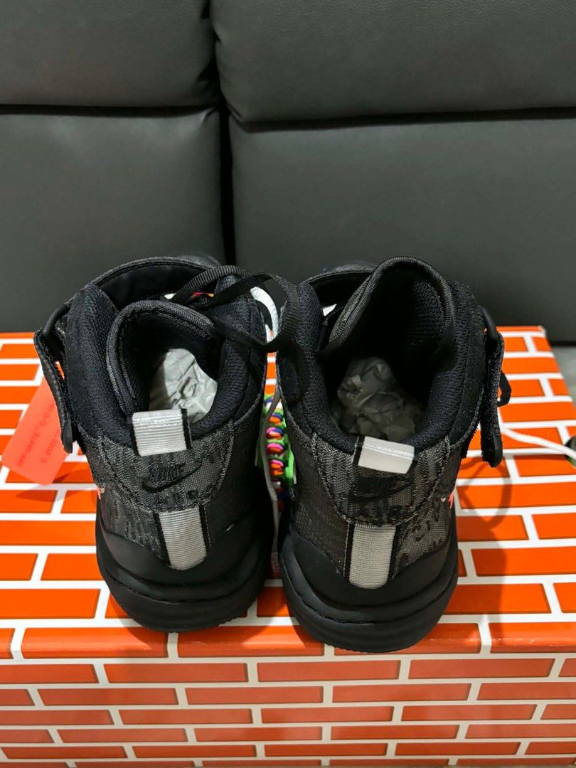Nike Off-White Air Force 1 Mid (Category: Sneakers) located in Quezon City. Submitted by bella_ciao (Listing ID 1411993112, Image 3). Description: - Off-White x Nike Air Force 1 Mid - Black and grey patterned upper - White laces - Black strap - Signature Off-White zip tie - Multi-colored sole - Includes original box Size: men’s 5.5 Women’s 7 24cm.
