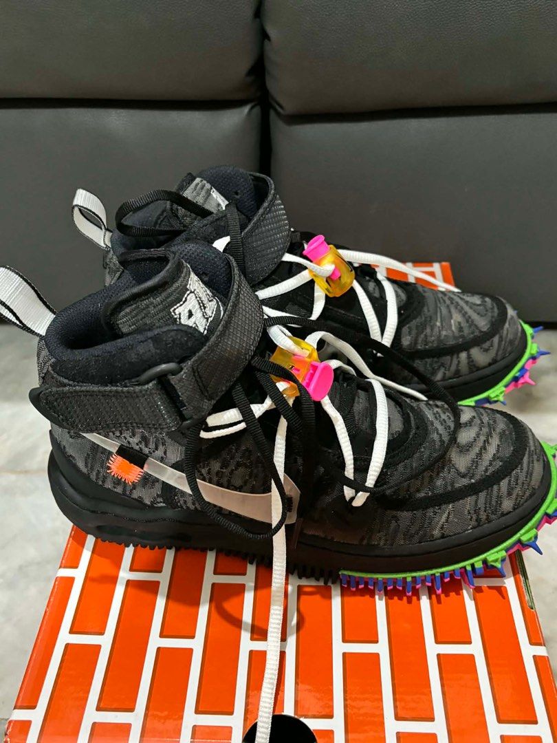 Nike Off-White Air Force 1 Mid (Category: Sneakers) located in Quezon City. Submitted by bella_ciao (Listing ID 1411993112, Image 2). Description: - Off-White x Nike Air Force 1 Mid - Black and grey patterned upper - White laces - Black strap - Signature Off-White zip tie - Multi-colored sole - Includes original box Size: men’s 5.5 Women’s 7 24cm.