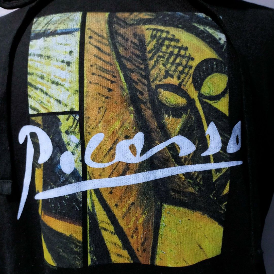 Picasso Art Hoodie (S) (Category: Hoodies) located in Cainta. Submitted by nkkn.ca.us (Listing ID 1412016688, Image 3). Description: - Black hoodie - Size: Small - Picasso art print on back and sleeve - Features a front pocket - Includes a hood - 'Picasso' printed on back and sleeve - Measurements in images - Brand new with tag .