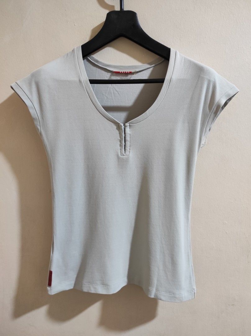 Prada red tab (Category: Luxury Apparel) located in Manila. Submitted by luxxxxxxxx.x (Listing ID 1412009010, Image 1). Description: excellent condition what you see is what you get size small.