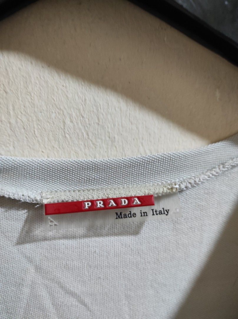 Prada red tab (Category: Luxury Apparel) located in Manila. Submitted by luxxxxxxxx.x (Listing ID 1412009010, Image 3). Description: excellent condition what you see is what you get size small.