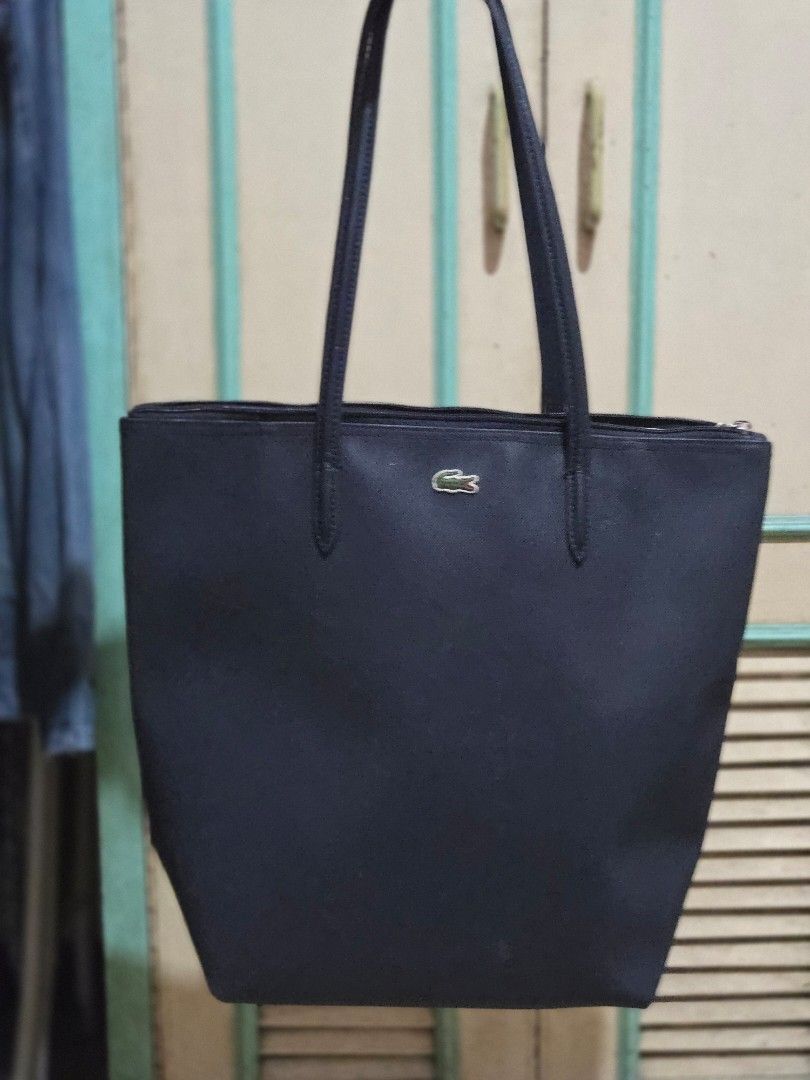 Preloved lacoste tote (Category: Shoulder Bags) located in Cainta. Submitted by nessft (Listing ID 1411986699, Image 1). Description: original. rarely used. see pix to appreciate.