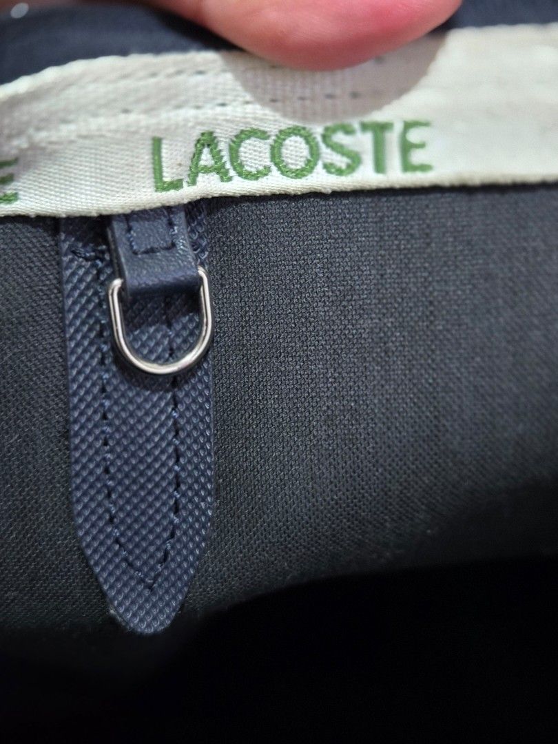 Preloved lacoste tote (Category: Shoulder Bags) located in Cainta. Submitted by nessft (Listing ID 1411986699, Image 3). Description: original. rarely used. see pix to appreciate.