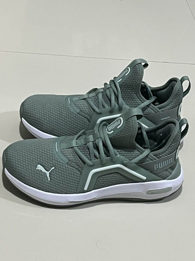 Puma Sneakers Green and White (Category: Sneakers) located in Lipa City. Submitted by edenelektra (Listing ID 1412082268, Image 2). Description: - Puma sneakers in green and white - Puma logo on side and tongue - Mesh upper for breathability - White sole - Unique lacing system - Cushioned heel for comfort - Ideal for everyday use and light activities -Size 8.5 .