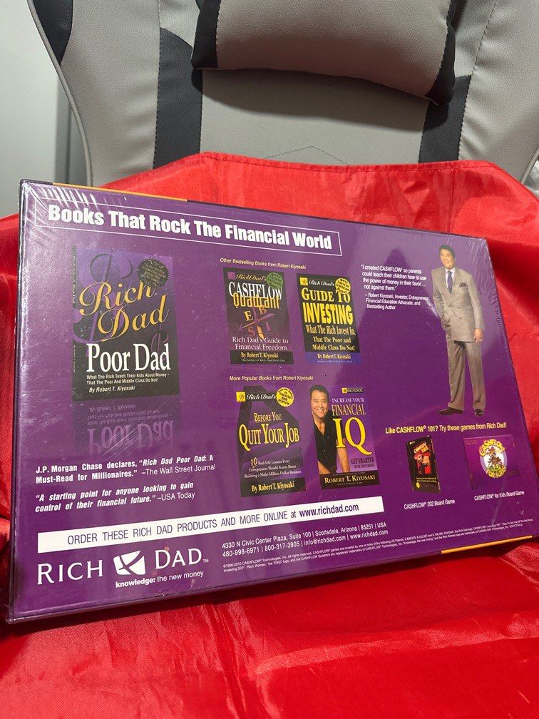 Rich Dad CASHFLOW board game (Category: Board Games & Puzzles) located in Singapore. Submitted by trust28 (Listing ID 1412130149, Image 2). Description: Rich Dad CASHFLOW board game. A cash flow board game teaches financial literacy, focusing on escaping the “rat race” by managing income, expenses, assets, and liabilities to build wealth..