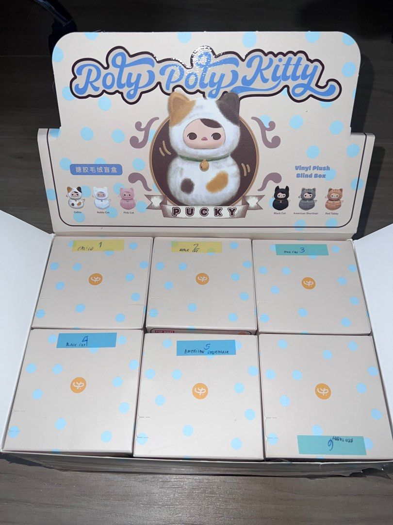 Roly Poly Kitty (Category: Designer & Blind Box Toys) located in Rizal. Submitted by decluttering.mess (Listing ID 1412031429, Image 2). Description: • Popmart • brand new, sealed foil • can choose character below SRP! • cute, for the cat lovers out there! • perfect for gift giving #popmart #rolypoly #cat #toylover #toycollector .