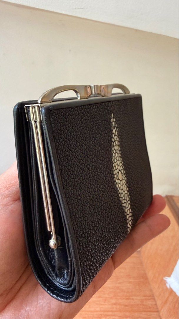 Stingray Leather Wallet (Category: Wallets & Card holders) located in Malolos. Submitted by flapnbloom.ph (Listing ID 1411978561, Image 2). Description: - Genuine stingray leather exterior with a unique central design - Silver-toned clasp - Black leather interior - Multiple card slots and cash compartments - Includes a coin purse - Size: 11 x 9.5 cm.