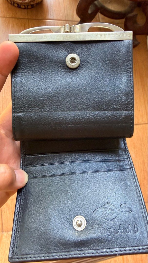 Stingray Leather Wallet (Category: Wallets & Card holders) located in Malolos. Submitted by flapnbloom.ph (Listing ID 1411978561, Image 3). Description: - Genuine stingray leather exterior with a unique central design - Silver-toned clasp - Black leather interior - Multiple card slots and cash compartments - Includes a coin purse - Size: 11 x 9.5 cm.