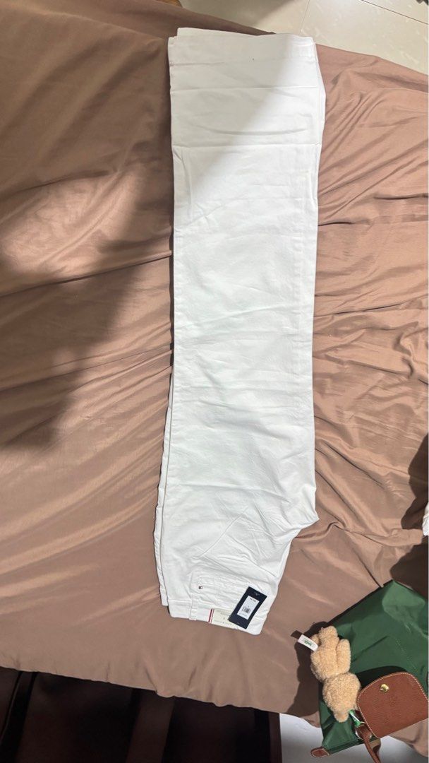 Tommy Hilfiger Chino pants/jeans (Category: Jeans) located in Anao. Submitted by declutterwithme0520 (Listing ID 1411959319, Image 3). Description: Repriced.Brand new with tag.selling low. Hindi kasya for mom.no time to return since bought this in TH Vancouver. For reference, i try it and okay yung fit nito sa’kin. Hindi lang talaga ako fan ng white jeans. I’m usually size 27 sa Uniqlo JW, and for other Uniqlo jeans, kasya sa’kin ang sizes 25–27 