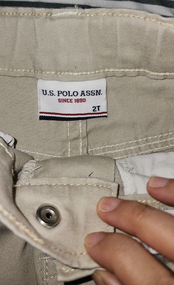 U.S. Polo Assn. Khaki Pants 2T (Category: Babies & Kids Fashion) located in Imus. Submitted by sashafame (Listing ID 1412078563, Image 2). Description: - U.S. Polo Assn. Khaki Pants - Size: 2T - Features: Button closure, two front pockets - Design: Classic - Material: Durable - Perfect for everyday wear.