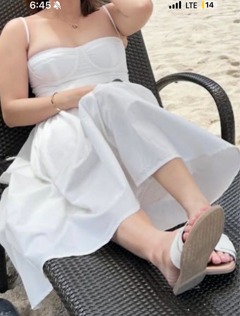 White Corset Flowy Dress (Category: Dresses) located in Bacoor. Submitted by officialchadaph (Listing ID 1412064411, Image 3). Description: - USED ONCE - White midi dress - Corset-style bodice - Sweetheart neckline - Spaghetti straps - Lightweight fabric - Ideal for summer or special occasions.