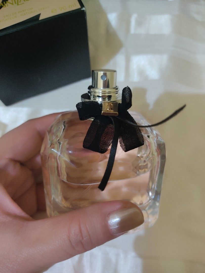 Yves Saint Laurent Mon Paris Eau de Parfum 90ml (Category: Fragrance & Deodorants) located in Cavite. Submitted by perfectfinds (Listing ID 1412108517, Image 3). Description: - Yves Saint Laurent Mon Paris Eau de Parfum - Size: 90ml - Bottle: Clear, square shape with pink liquid and black ribbon - Packaging: Includes original black box This is a replica I tried from an online seller. I don't love the scent. Sprayed a few times. .