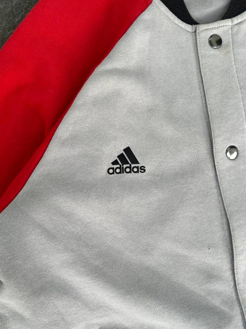Adidas varsity jacket (Category: Activewear) located in Manila. Submitted by styleandfly191238 (Listing ID 1412167649, Image 3). Description: length 29 width 24 issue none color rate 10)10 condition -excellent.