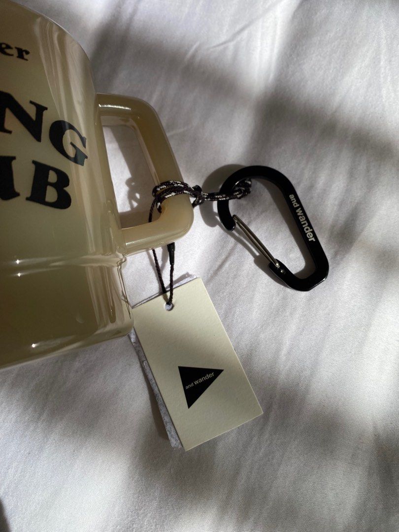 and wander Hiking Club Mug (Category: Coffee & Tea Tableware) located in Quezon City. Submitted by closingoutsale (Listing ID 1412151378, Image 2). Description: Brand new - and wander Hiking Club mug - Features brand logo and "Hiking Club" print - Includes carabiner - Comes with a tag - Material: Polyethylene - Made in China.