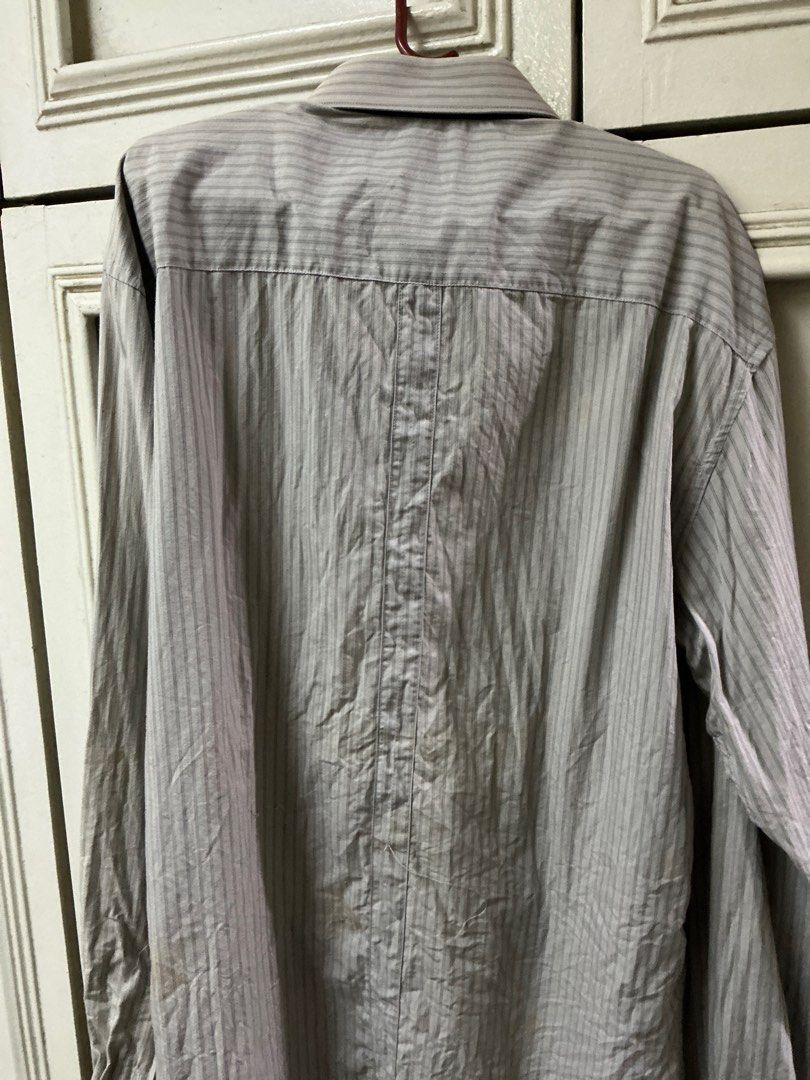 Arrow Striped Long Sleeve Shirt - Large (Category: Tshirts & Polo Shirts ) located in Manila. Submitted by harbs05 (Listing ID 1412254086, Image 3). Description: - Arrow long sleeve shirt - Size: Large - Design: Vertical stripes - Style: Button-down front with classic collar - Features: Chest pocket and buttoned cuffs - Color: Neutral, versatile for various occasions.