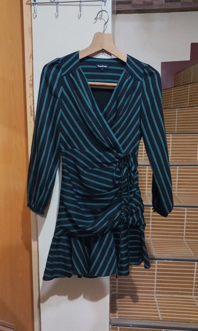 Bebe Wrap Top Ruched Longsleeves Mini Dress (Category: Dresses) located in Gattaran. Submitted by uploadtounload (Listing ID 1412235795, Image 1). Description: .