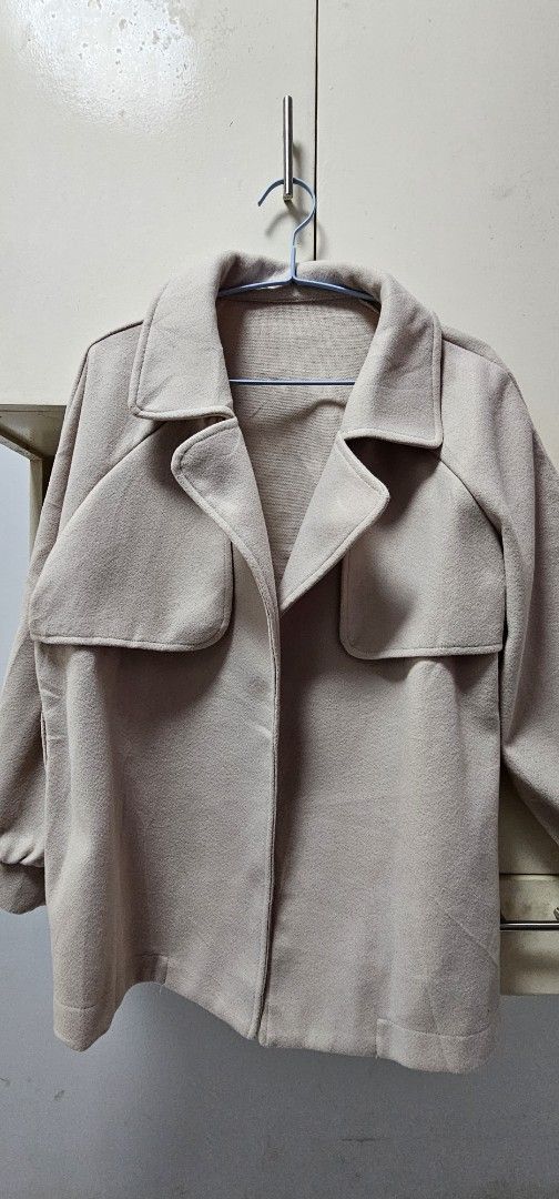 Beige Jacket (Category: Coats, Jackets and Outerwear) located in Plaridel. Submitted by _bbbfamous (Listing ID 1412161763, Image 1). Description: - Beige jacket - Long sleeves - Collared neckline - Two front pockets - Lightweight fabric - Versatile design.