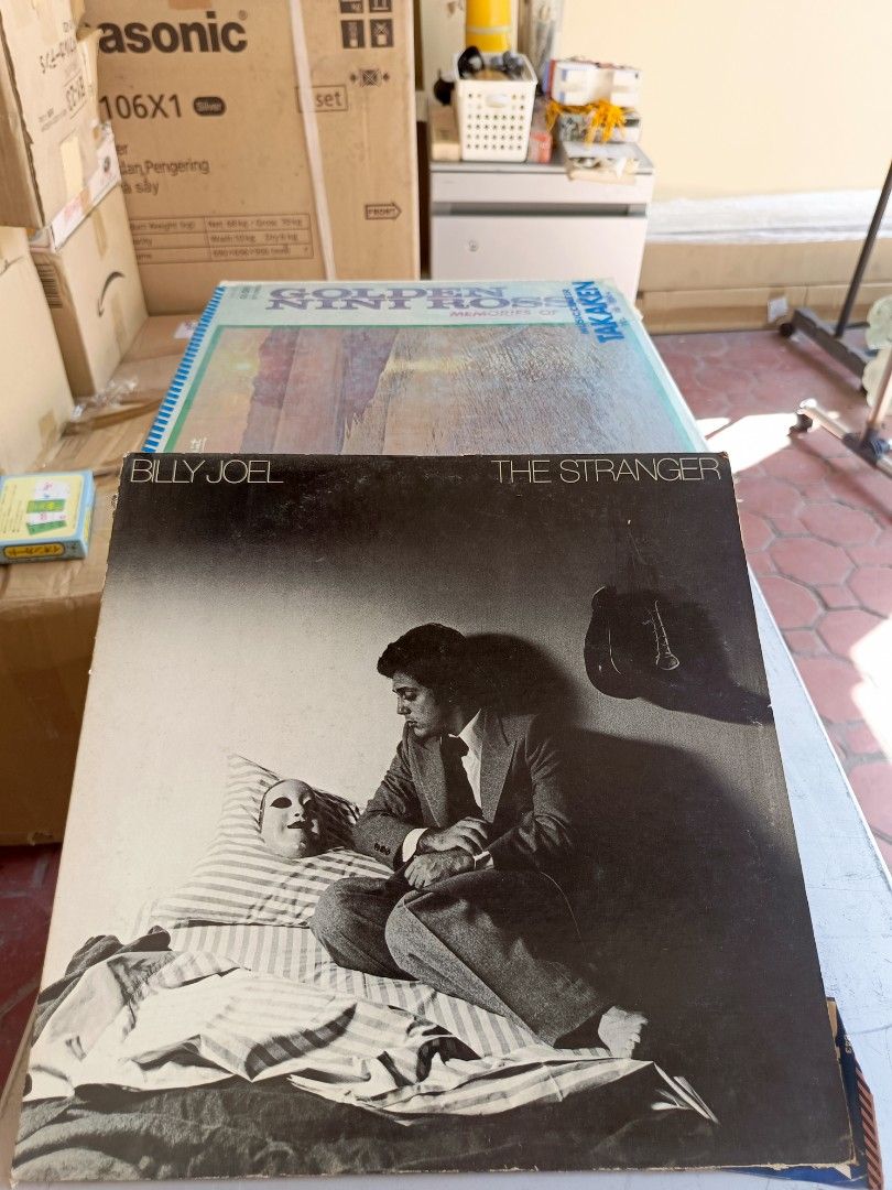 Billy Joel - The Stranger Vinyl Record (Category: Vinyls) located in Legazpi City. Submitted by kikosgarage (Listing ID 1412225449, Image 1). Description: Original vinyl record of Billy Joel's album, "The Stranger." The album cover features a black and white image of Billy Joel. The album title is visible on the cover. The record is in its original sleeve. The album is a classic and a must-have for any vinyl collector..