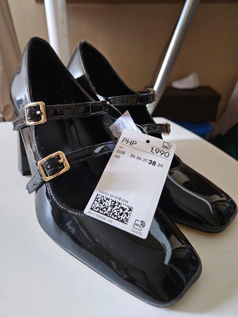 Black Mary Jane Shoes (Category: Heels) located in Mandaluyong City. Submitted by ber12 (Listing ID 1412204534, Image 1). Description: - Black Mary Jane shoes - Buckle straps - Glossy finish.