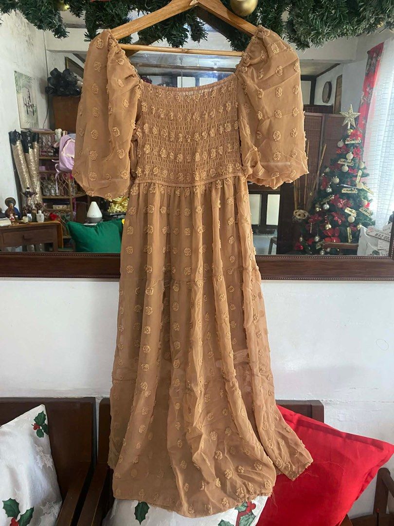 Brown Puff Sleeve Maxi Dress (Category: Dresses) located in Marikina City. Submitted by cathy.14 (Listing ID 1412156507, Image 1). Description: - Brown maxi dress - Square neckline - Puff sleeves - Smocked bodice - Tiered skirt - Textured pattern - Lightweight fabric - Ideal for warm weather.