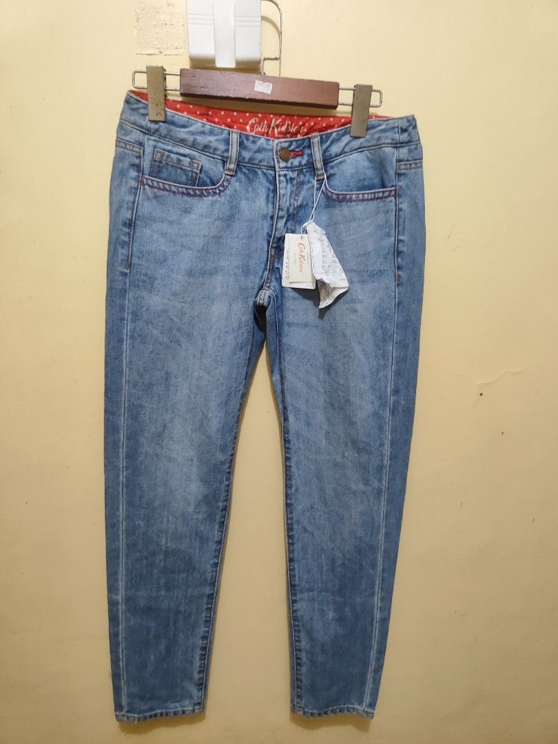 Cath Kidston Jeans (Category: Luxury Apparel) located in Paniqui. Submitted by arlenepari29210 (Listing ID 1412312608, Image 1). Description: - Cath Kidston light wash jeans - Red polka dot lining - Red stitching details - Leather patch at the back - Classic five-pocket design - Model: K-111 - Waist Size tape measure 30, Length 37 - Not stretchy - Sf c/o buyer.
