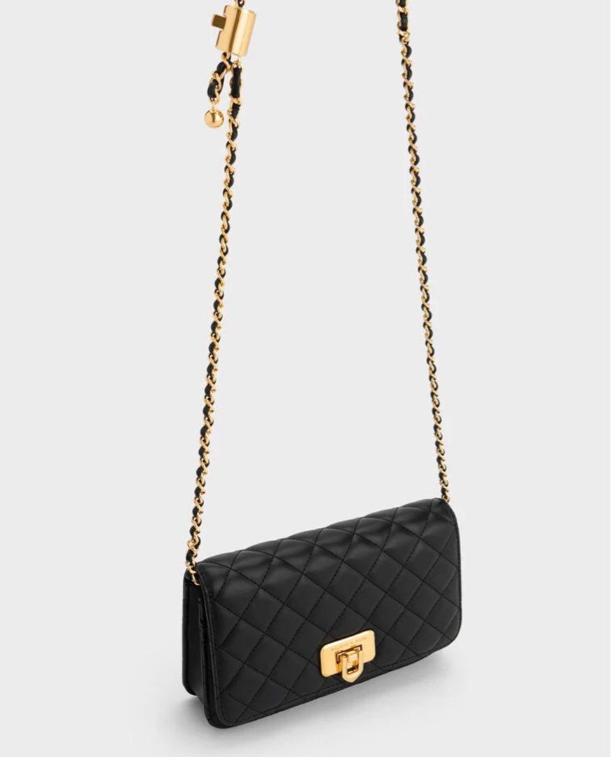 Charles & Keith Quilted Chain Bag (Category: Luxury Bags & Wallets) located in Masinloc. Submitted by em1997 (Listing ID 1412164821, Image 3). Description: may peeling siya sa side part since laging binubuksan at sara pero hindi noticeable. pm for photos.