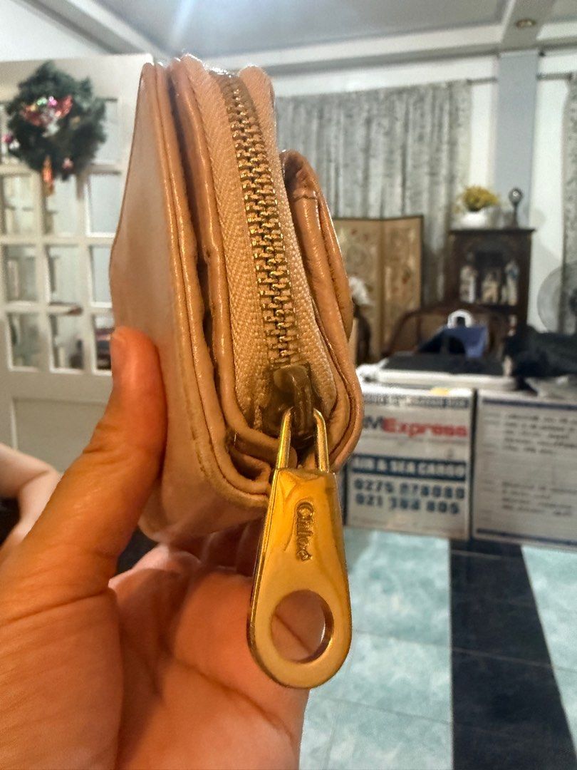 Chloe Bow Detail Zip Around Wallet (Category: Other Accessories) located in Taguig. Submitted by bianca625 (Listing ID 1412231736, Image 3). Description: Chloe short wallet.